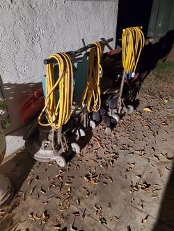 Floor buffers , professional mops, buckets old janitorial equipment