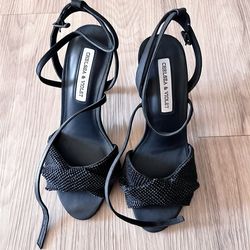 Black strappy heels with rhinestone detail