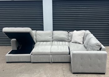 ROOMS TO GO “Kirkwell” Sectional Sleeper w/Storage + Chaise