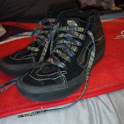 Vans all black with retro shoelaces
