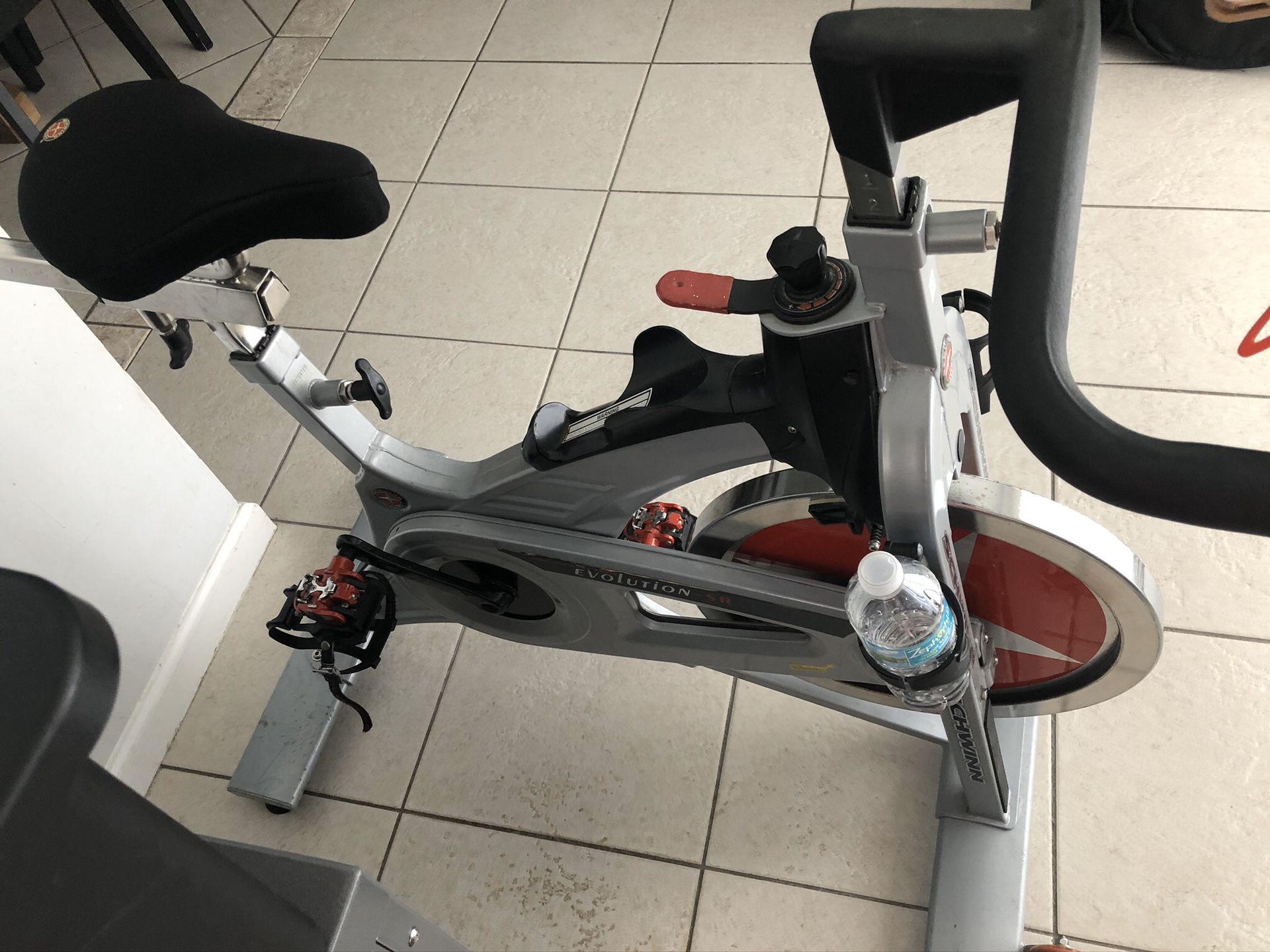 Schwinn Evolution SR Spinning/Spin/Exercise Bike with tablet holder, phone holder, and Wahoo cadens tracker