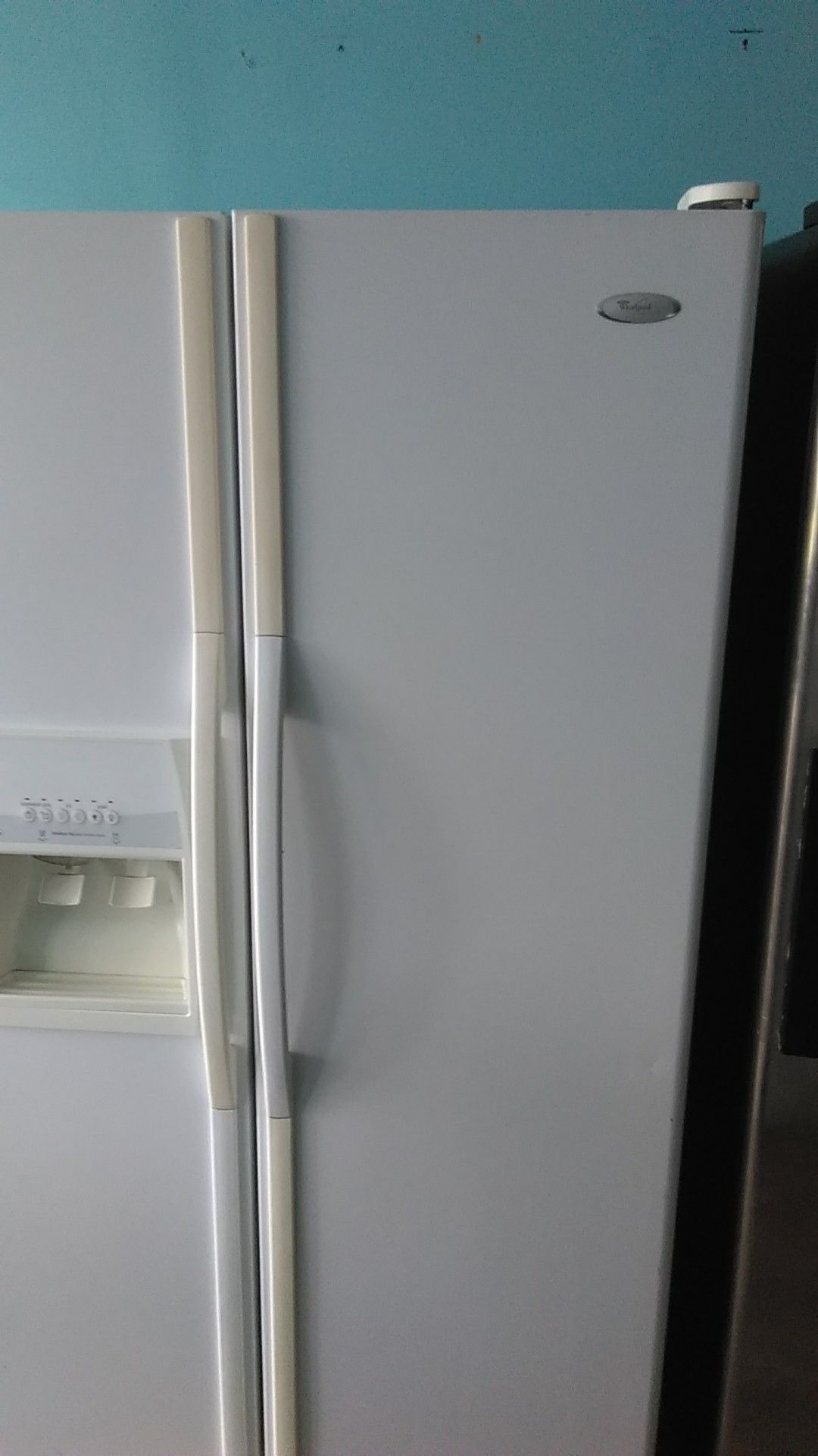 Whirlpool gold series sidebyside with icemaker and water dispenser