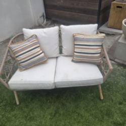 Love Seat With Cushions. Wicker.
