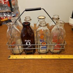 8 Wire Rack Of Assorted Old Milk Bottles