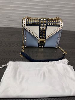 Blue white with gold accents purse