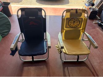 Two Tommy Bahama back pack beach chairs with 4 positions 35.00 each