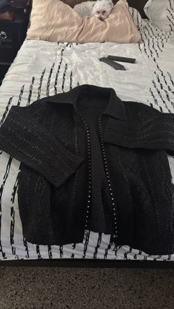Black jacket with a diamond zipper