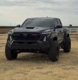 Toyota Tacoma wheels tires leveling & lift kits accessories lights side steps bed covers intakes (We Finance)