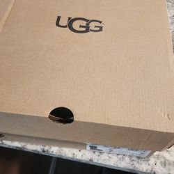 Ugg Booties New In Box.  Size 7  Faux White Fur 