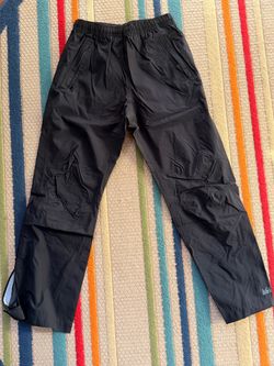 REI youth L (10/12) waterproof pants.