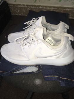 Gray nikes size 8.5 in men asking $30 Vans size 8.5 men’s asking $20