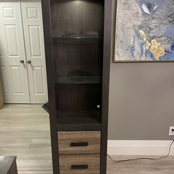 Two Ashley Furniture  Hatch Tall cabinet 