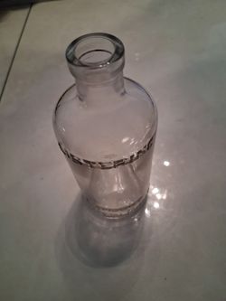 Vintage listening glass bottle engraved lambert pharmacology company bottom is also engraved