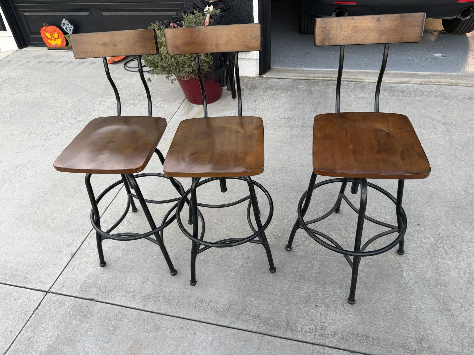 Three Adjustable Barstools
