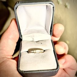 Stamped Gold Wedding band with a little under 1/2 kt of Diamonds
