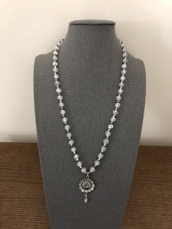 White and silver beads string with pendant