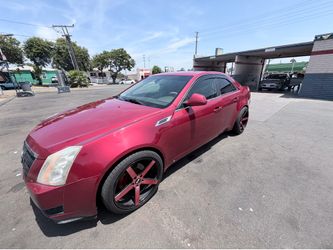 Cadilla cts, título limpio, color rojo, llantas nuevas