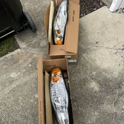 03 Monte Carlo Headlights. Brand New