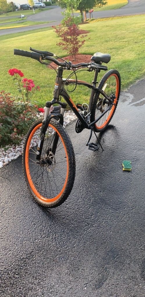 Orange and Black Mongoose Mountain Bike