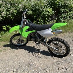 Kx100 lectron carb outlet