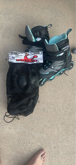 Size 9 women rollerblades and med pads
