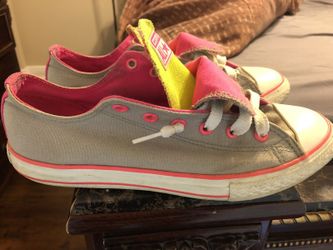 Pink and yellow converse