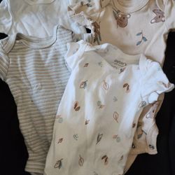 4 Newborn Onesies Carters