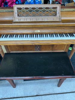 Free Piano with bench works probably needs tuning