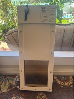 Automatic dog door