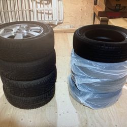 Snow Tires 205/75 R15 with  4 Aluminum Wheels 