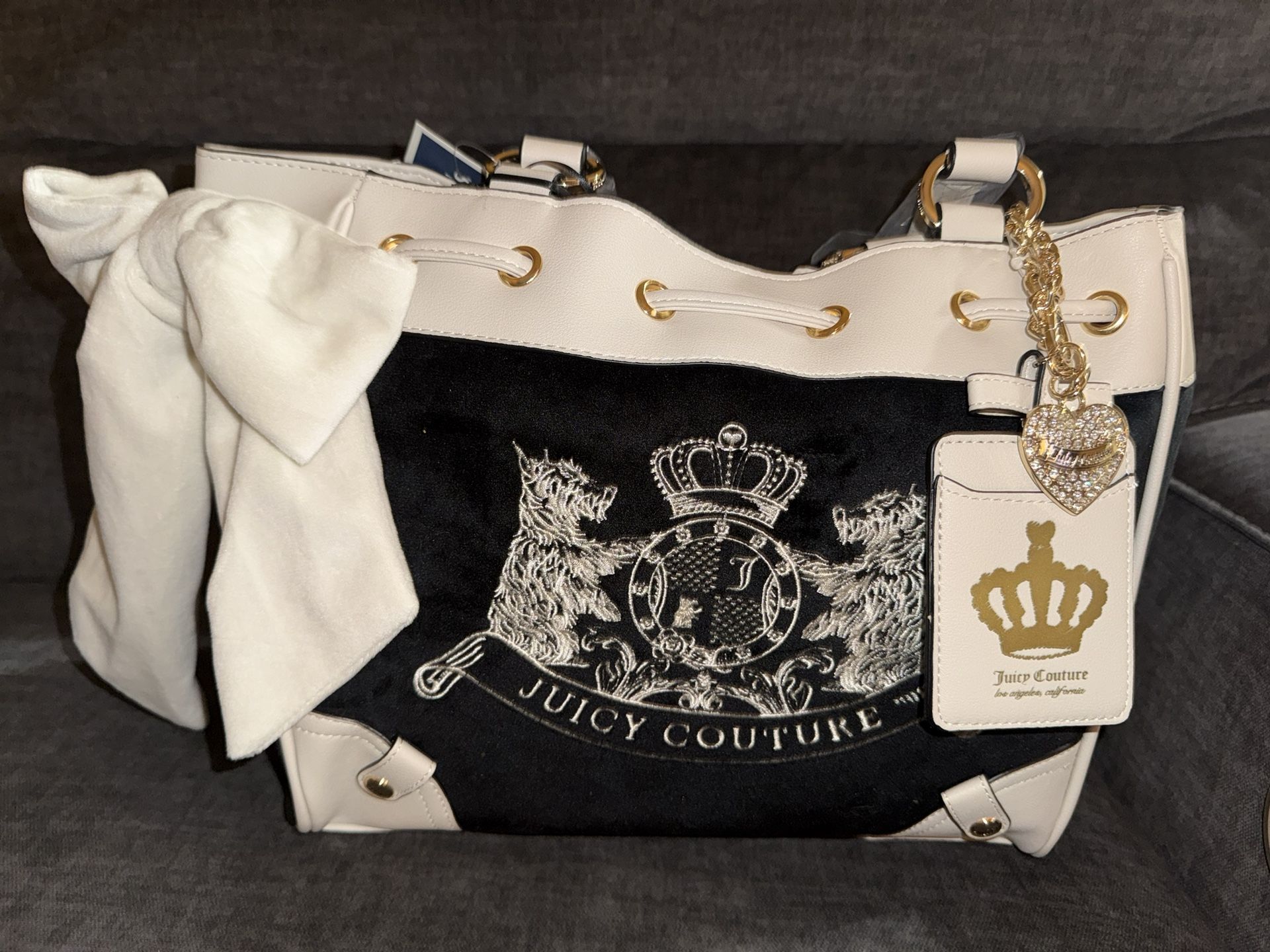 Black and white Juicy Couture daydreamer bag with gold accents #glamour
