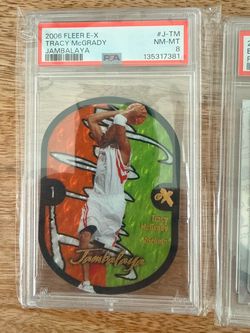 2006 Fleer E-X Tracy McGrady Jambalaya PSA 8