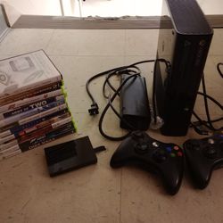 4gb Xbox 360 E w/ cables, 2 controllers, 128gb hard drive, and 10 games