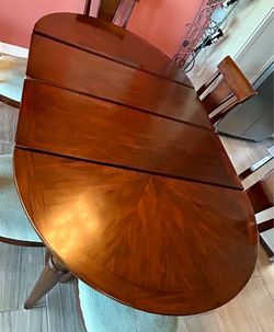 Wood dining room table and 6 chairs