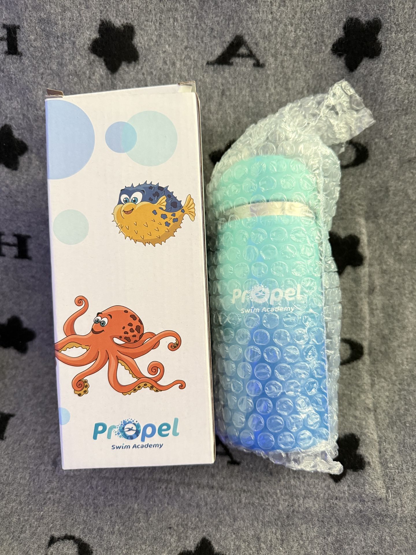 Water bottle with straw