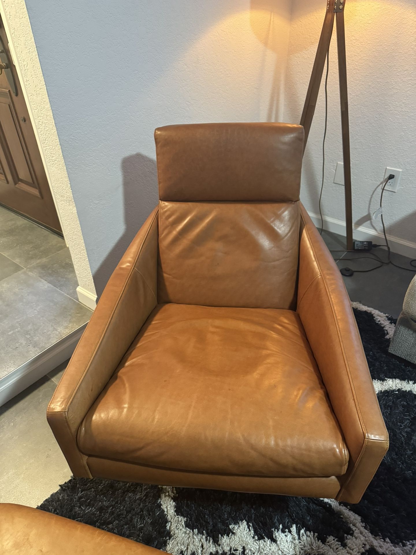 West Elm Brown Leather Swivel Chair With Ottoman
