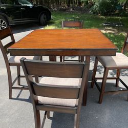 Pub Table with four upholstered chairs 