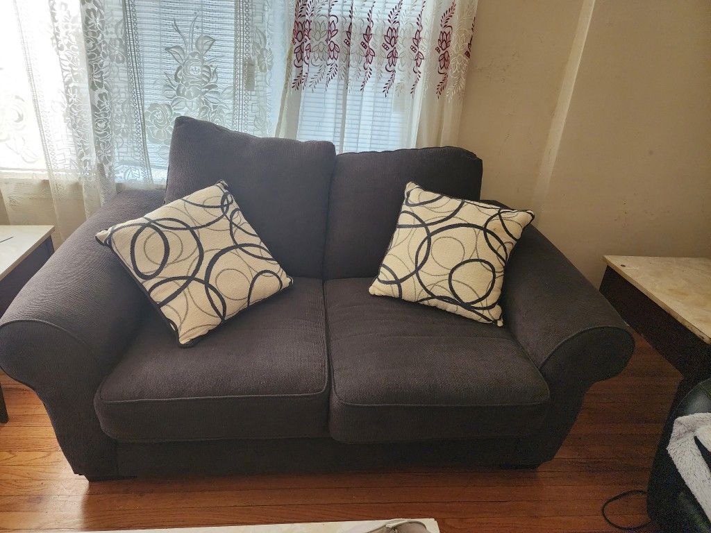 Chic Dark Blue Loveseat couch with Stylish Pillows