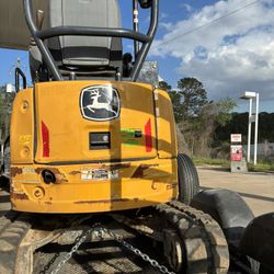 The John Deere 17G is a compact Mini excavator 