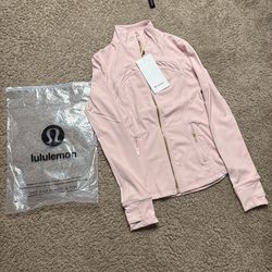 Pink lululemon with gold zippper