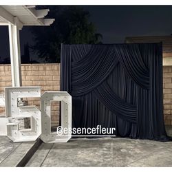 Draped backdrop and marquee Numbers