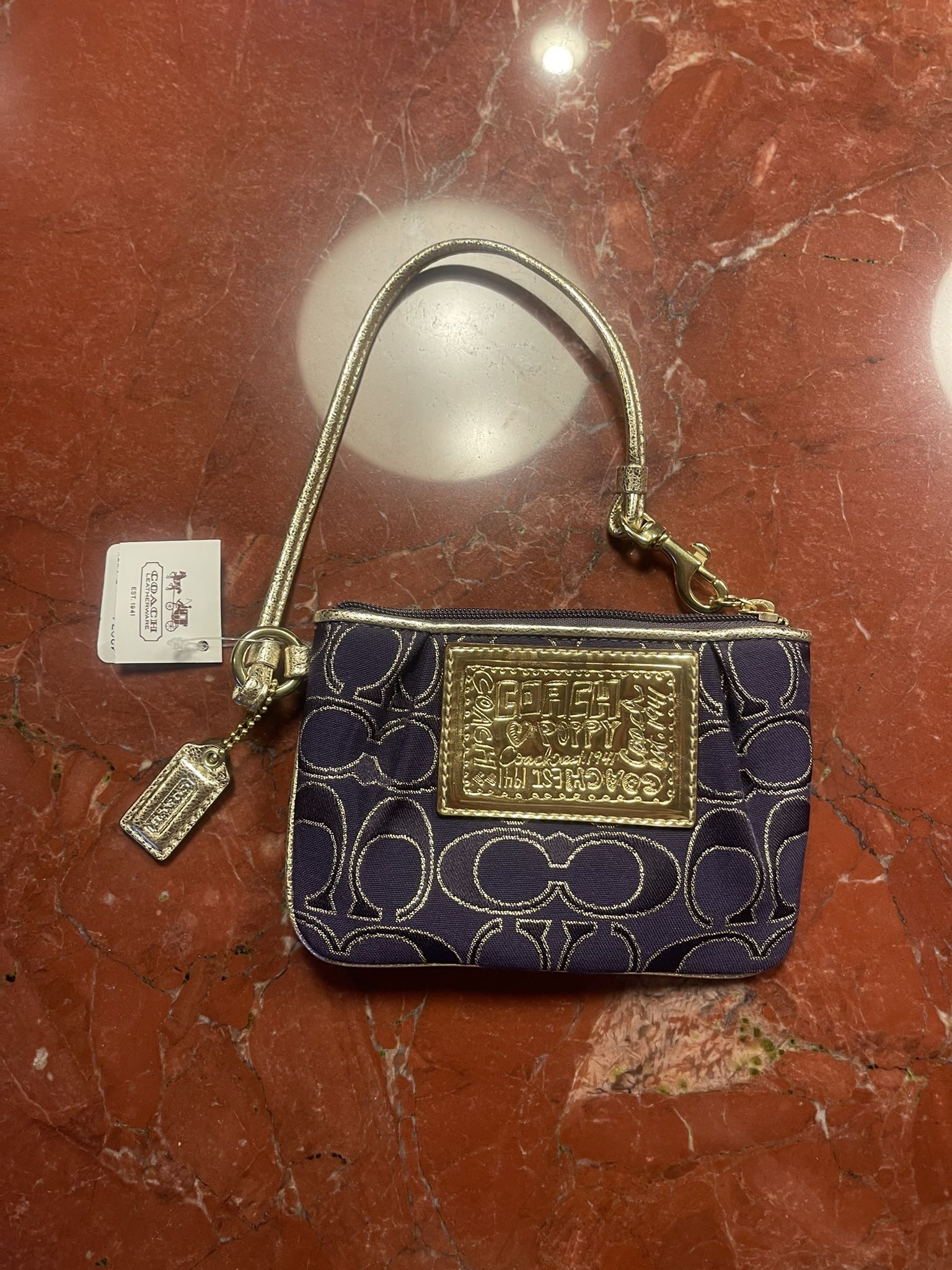 coach vintage poppy wristlet