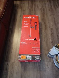 M18 string trimmer and blower with battery and charger