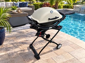 Delivery Available! Weber Q 1200 Portable Gas Grill with Portable Grill Stand and Cover! Great condition! Retails $389.99