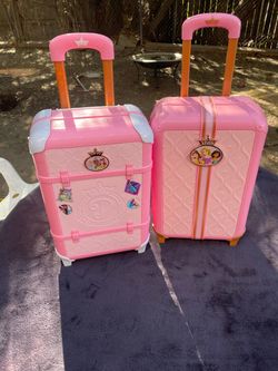 Two princess children roll about