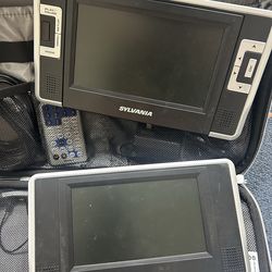 Sylvania Dual Screen SDVD8737 7" Portable DVD Player  Includes all wires, headphones, remote and carrying case