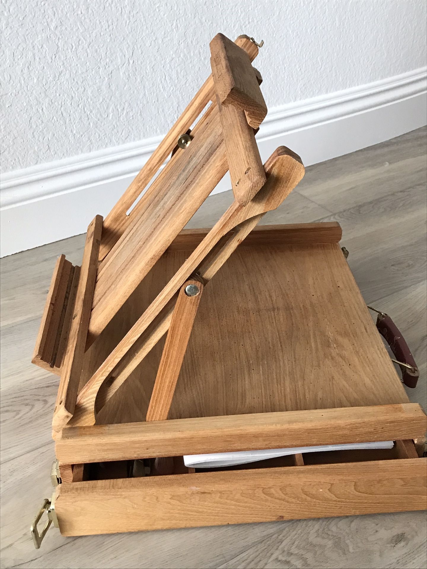 Wood easel tabletop With Book and Brushes