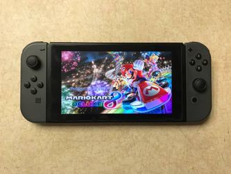 NINTENDO SWITCH V2 with 125 SWITCH GAMES + 7000 RETRO CLASSIC GAMES