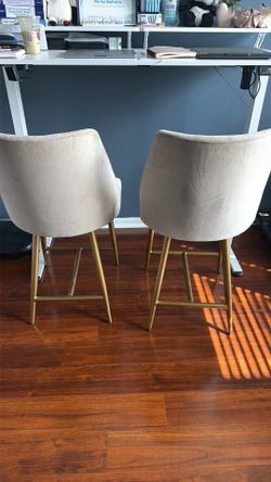 Two suede chairs