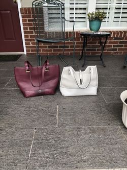 Two Brand Name Leather Handbags